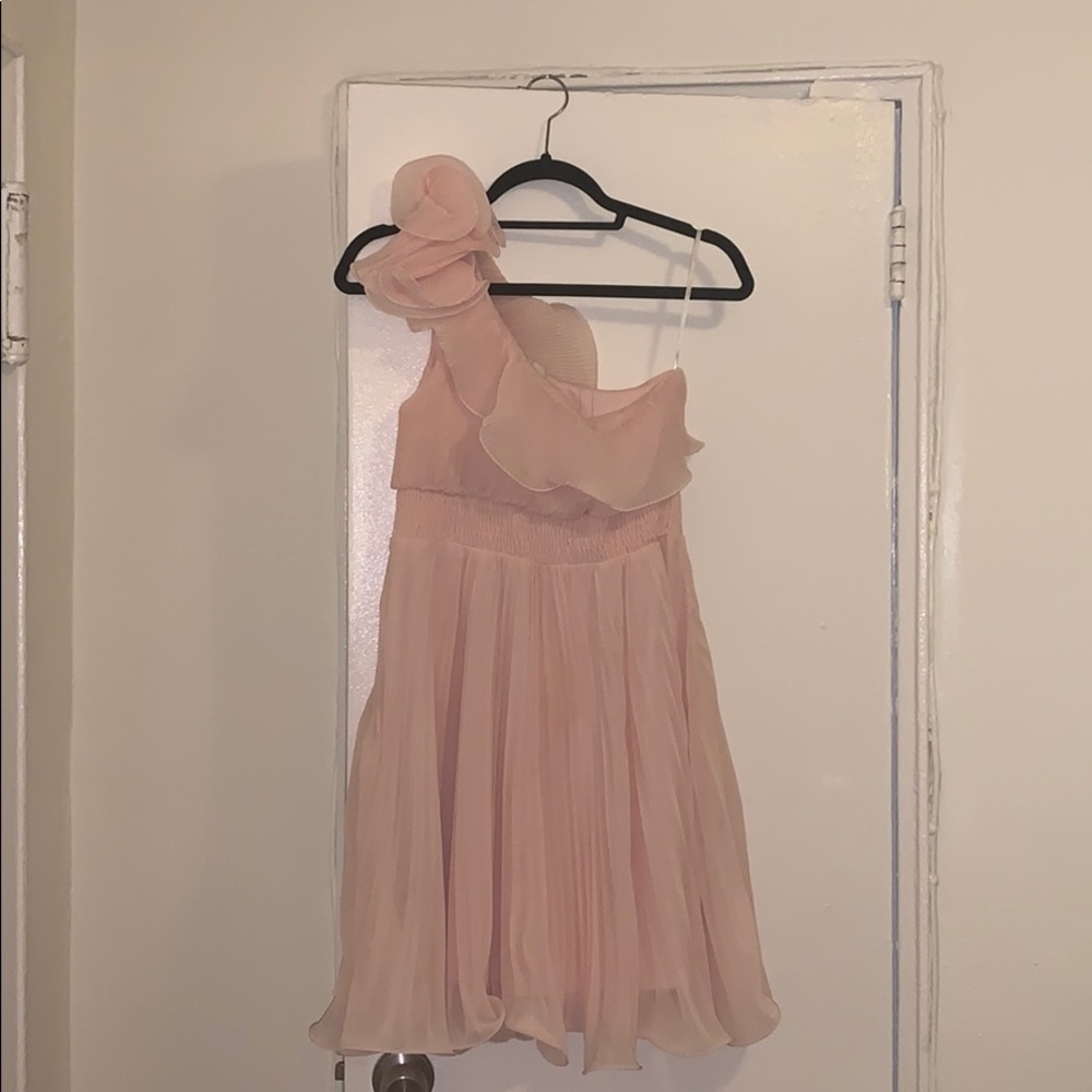 One shoulder dress with dramatic shoulder